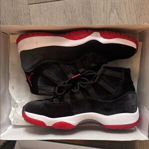 Women’s Air Jordan 11 Retro Black and Red Sneakers